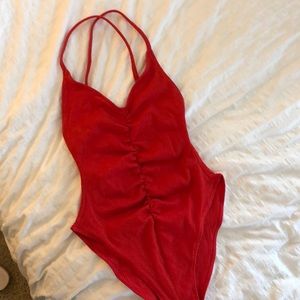 Out From Under Red Bodysuit